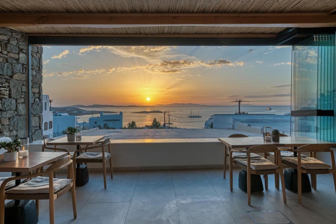 Louis Vuitton Mykonos  Hostels design, Restaurant design